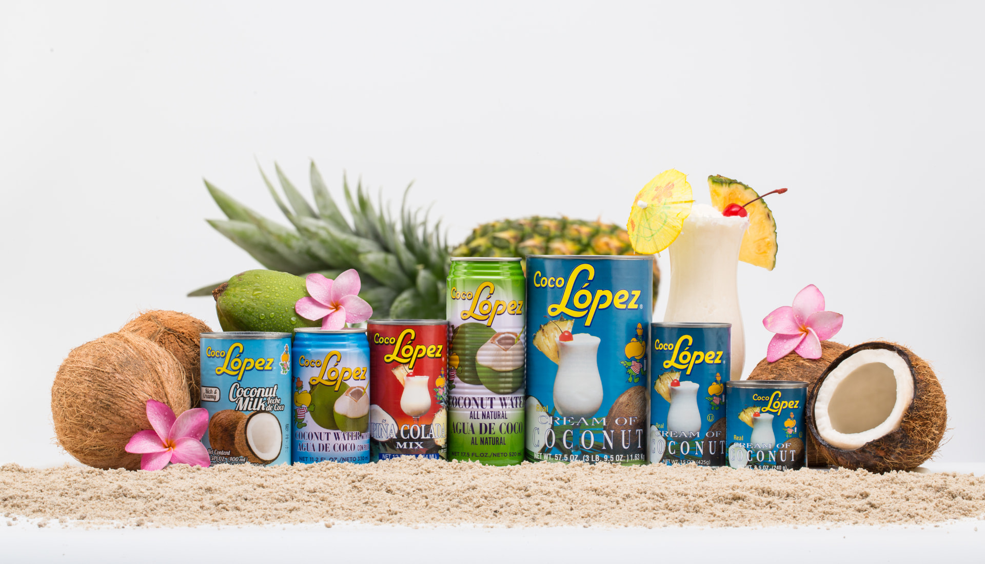 The Coco Lopez product range — cream of coconut cans, coconut milk, coconut water and piña colada mix